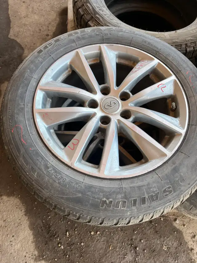 215/65R17 Ice Blazer All Season 17×7.5 OEM Wheels (Infiniti)